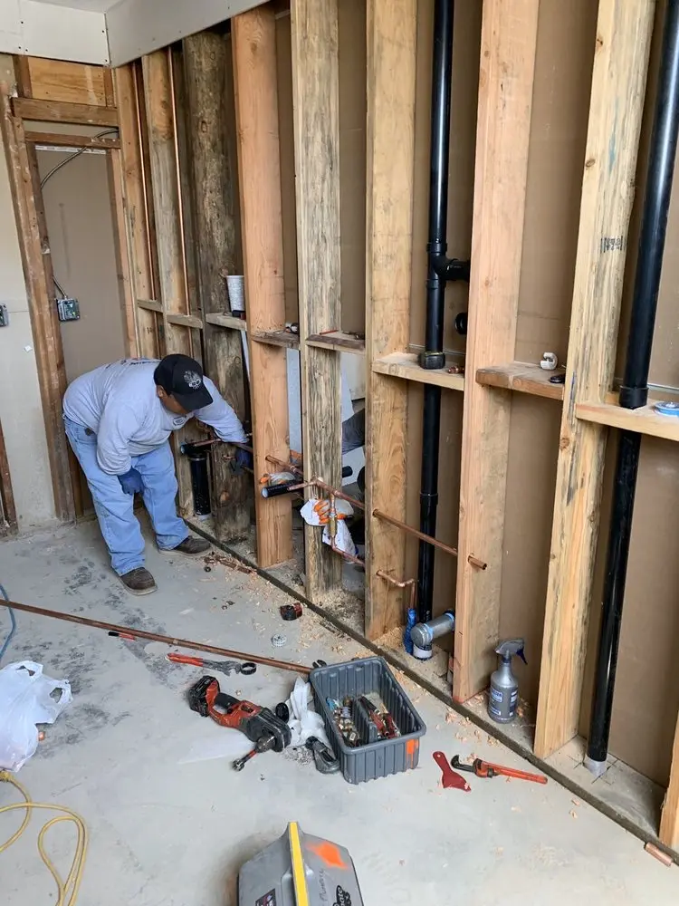 Commercial rough-in plumbing for Water Heater Replacement in East Plumville